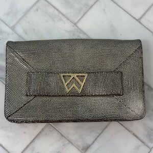 Kelly Wynne Black and Gold Clutch